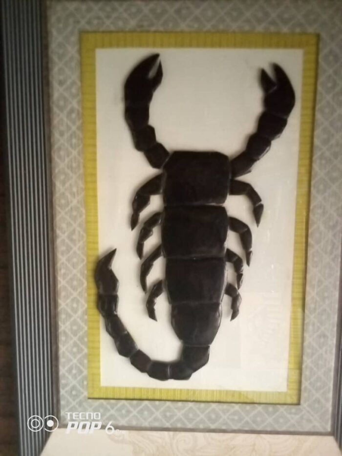 African Art carved from Cote d'Ivoire. Scorpion